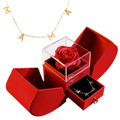 Red rose in a clear box with a gold necklace with MAMA 